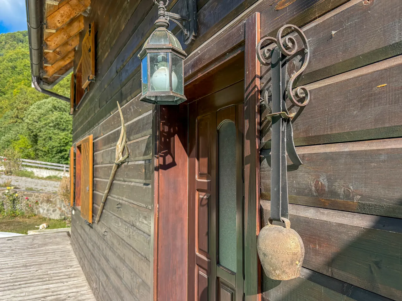 The front door with an old cowbell
